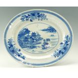 A mid 19th Century Mason's Ironstone transfer decorated blue and white ashet, having a Chinese scene