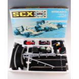 A SCX Interlagos Scalextric-type slot car racing game