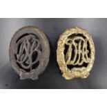 An early 20th Century German DRA sports badge together with a post-War DSB badge
