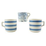 A large Crown Devon mug "A Yorkshireman's Advice To His Son" together with two Cornish-ware mugs,