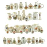 A quantity of Wiltshaw & Robinson and other crested china vases, jugs, etc