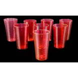 A set of eight Victorian cranberry glass beakers, approximately 5.5 x 9.5 cm