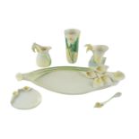 Five items of late 20th Century Franz porcelain having relief moulded floral decoration,