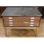 A 1930s painted pine plan chest, raised on a beech wood stand, 121 x 88 x 84 cm