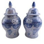 A large pair of Chinese blue and white covered jars, late 20th Century, 45 cm