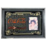 A Coca-Cola advertising mirror, 33 cm x 23 cm