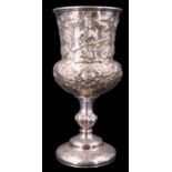 A Victorian electroplate Rifle Volunteer trophy cup, engraved and relief decorated in depiction of a