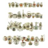 A quantity of W H Goss and other crested china vases, jugs, etc