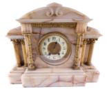 An early 20th Century alabaster mantle clock, having a Japy Freres movement striking on a gong, an