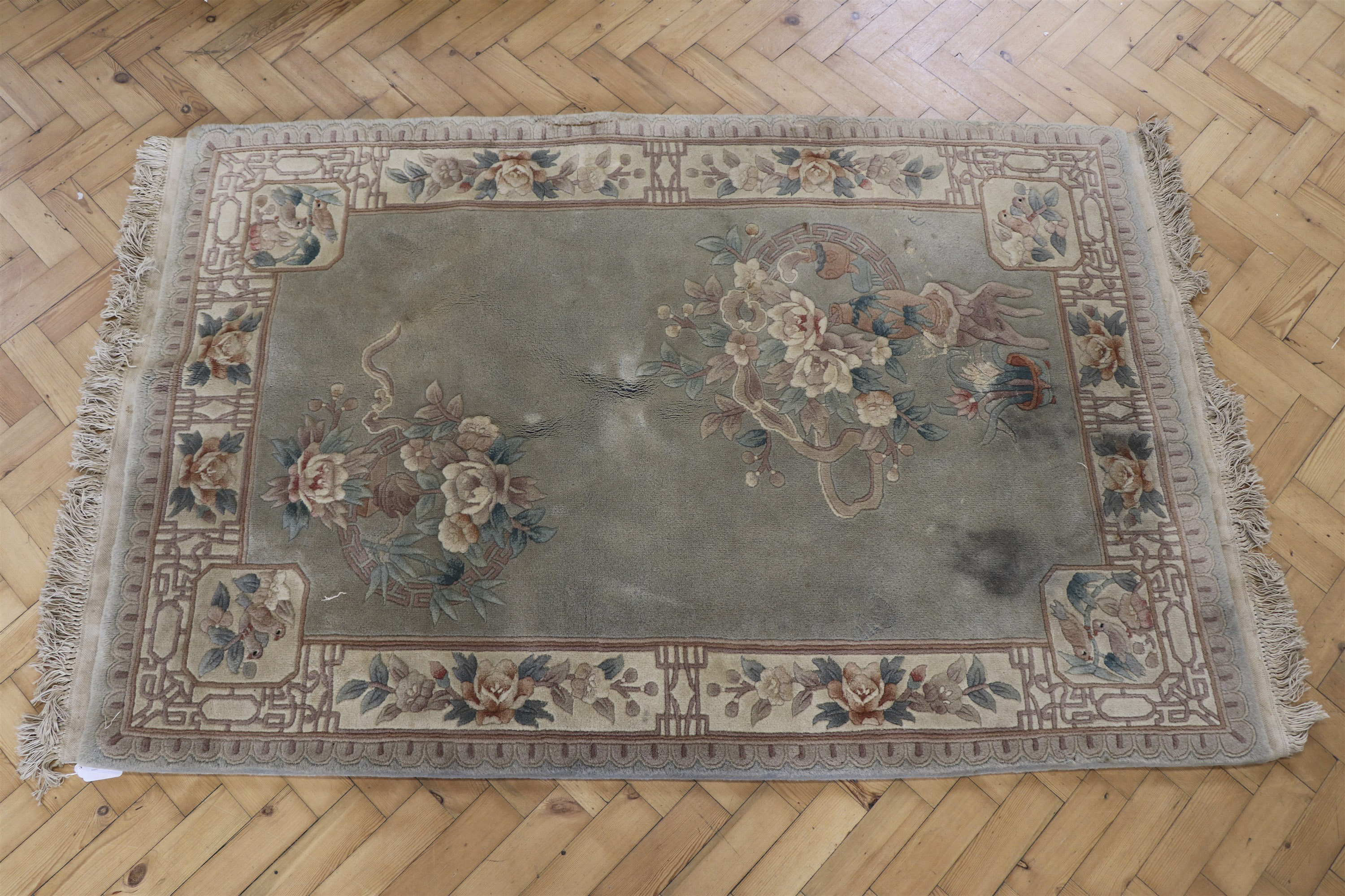 A Chinese wool-pile rug, 200 x 123 cm