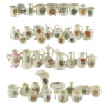 A quantity of W H Goss and other crested china vases, jugs, etc