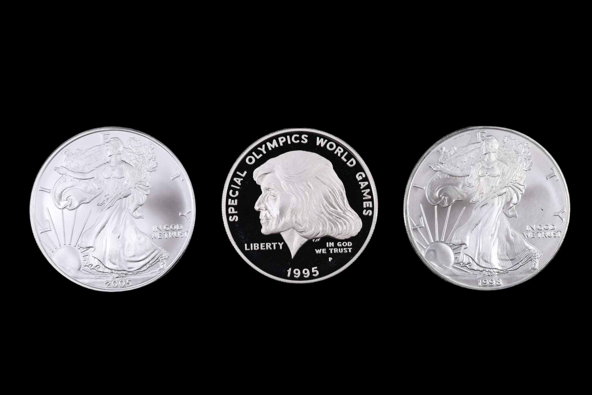 Three silver US coins, comprising a 2005 and a 1998 "Silver Eagle" dollar, and a 1995 "Special - Image 3 of 4