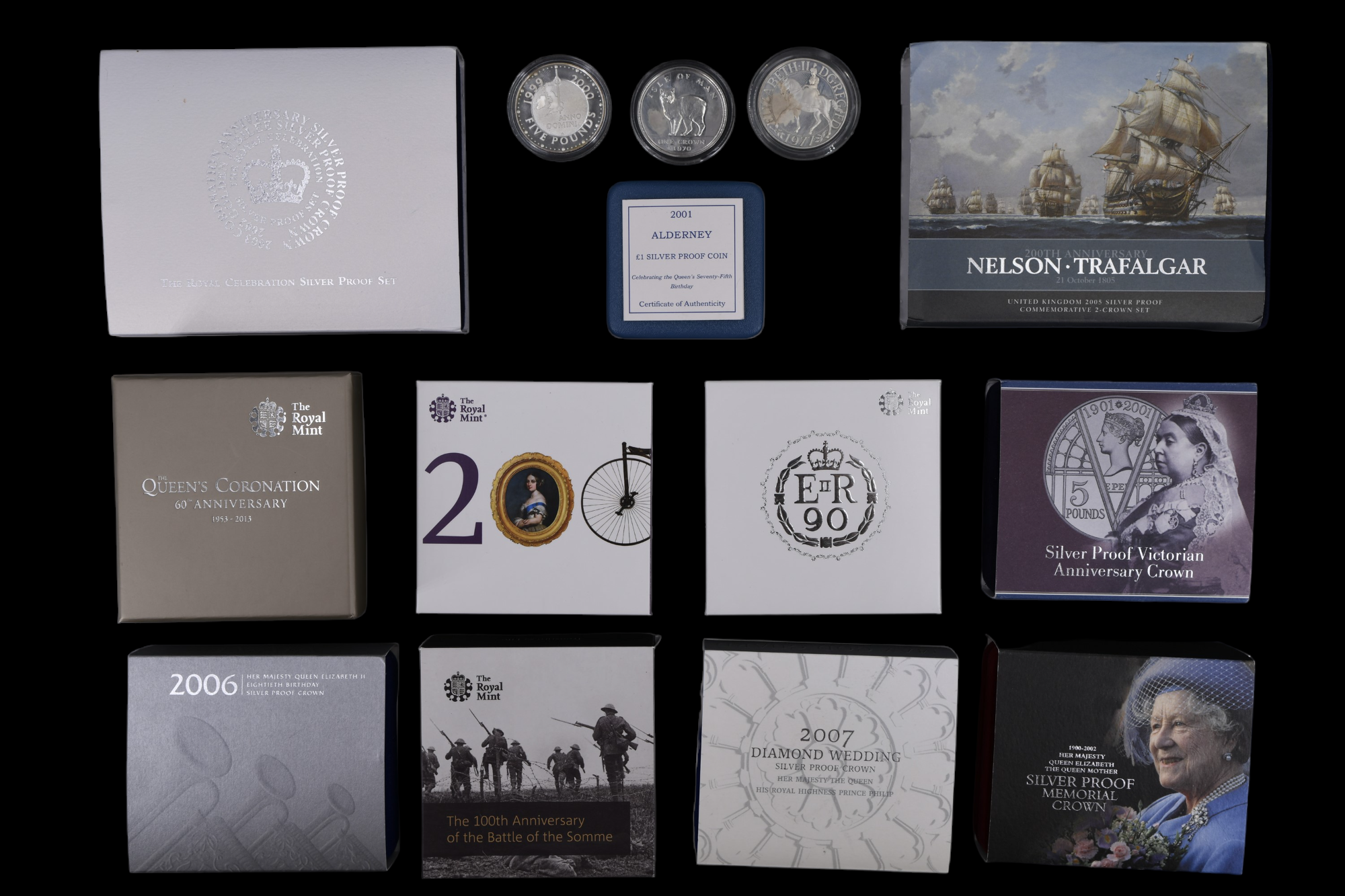 A group of cased silver proof commemorative coins, including Nelson Trafalgar 200th Anniversary