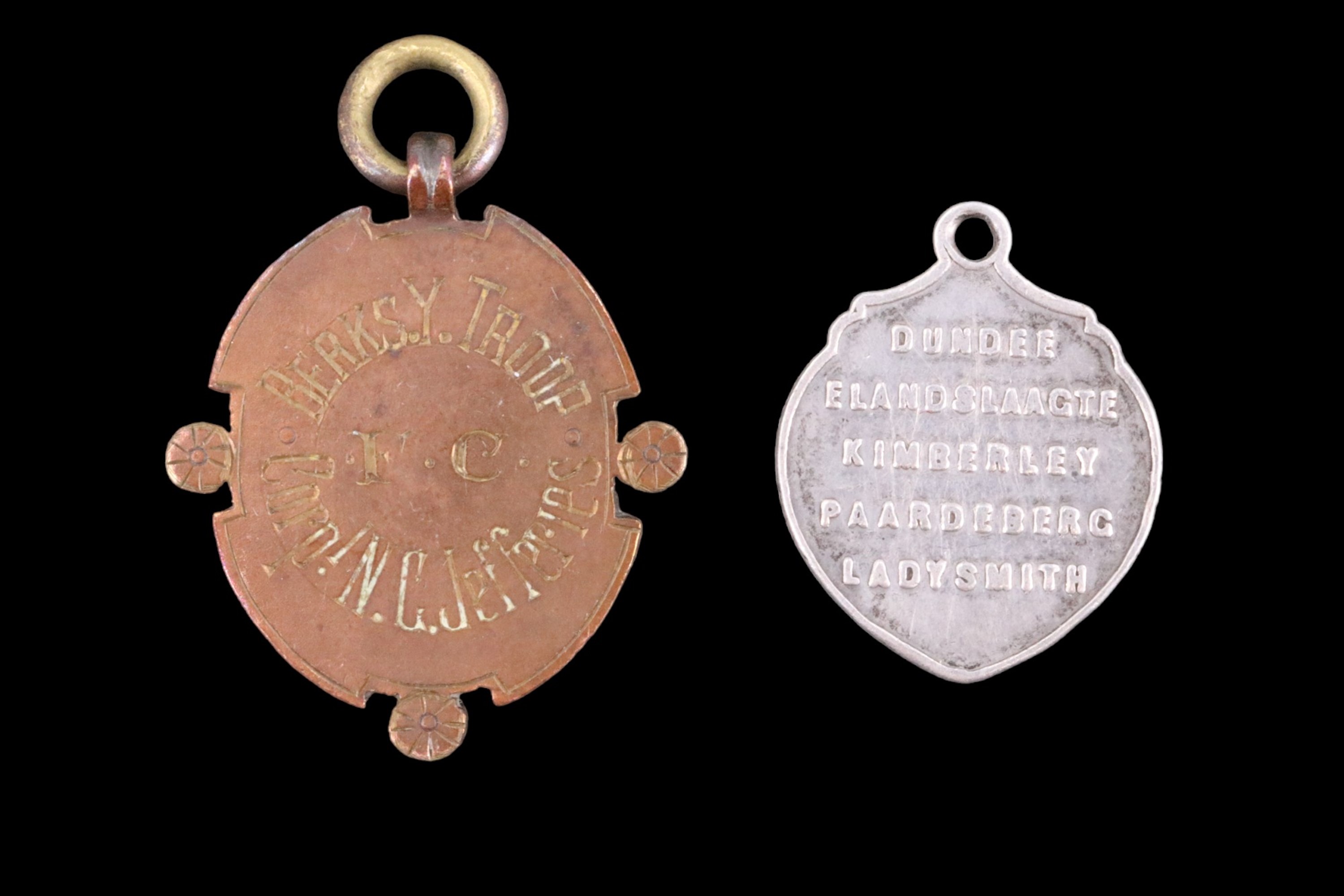 A Berkshire Yeomanry enamelled prize fob medallion together with a Boer War "Wiping Something off - Image 2 of 2