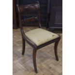 A Regency mahogany sabre leg dining / stand chair, 85 cm high