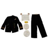 A 1940s Royal Navy lieutenant commander's tunic, trousers, cap covers and commission document