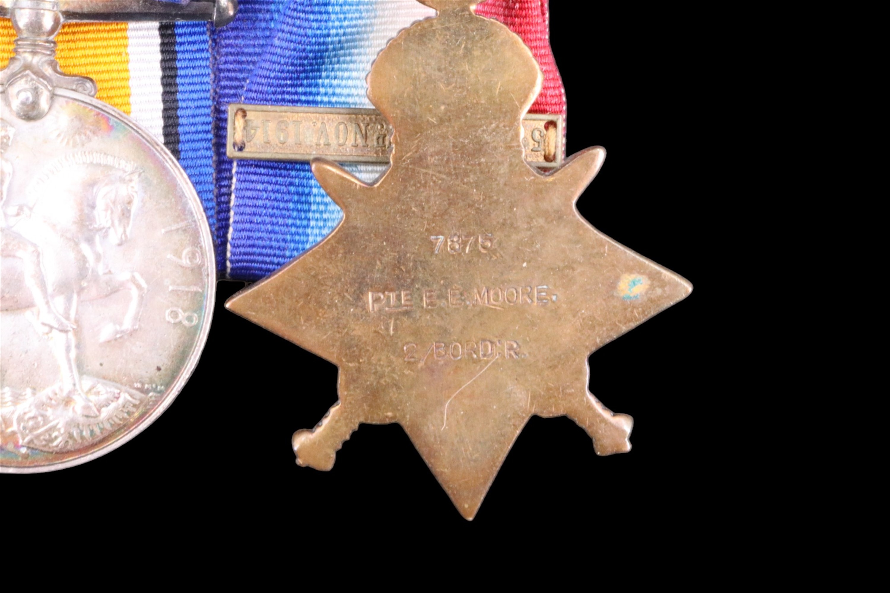 A 1914 Star with clasp, British War and Victory Medals to 7876 Pte E E Moore, 2 Border Regiment - Image 3 of 6