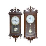 A contemporary Timemaster 31 day mahogany wall clock, 73 cm together with a Acetime wall clock, 79
