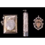 A George V silver fob vesta case, bearing engraved monogram, the interior gilt, and an Edwardian