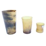 Three various Victorian horn beakers together with a napkin ring having an applied vacant plaque,