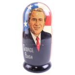 A Russian Matryoshka doll portraying US Presidents from Carter to George W Bush, 18 cm