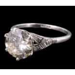 An Art Deco 2.8 carat diamond solitaire ring, having a 9 mm brilliant in a Tiffany style setting