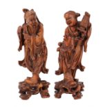 A pair of Chinese carved wooden figures, circa 19th Century, approx 14 cm