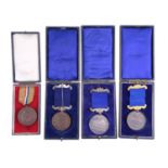 Four 1920s Hull Education Committee Perfect Attendance medals in silver and bronze together with a