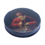 An early 19th Century hand painted circular mache snuff box depicting a bearded man counting