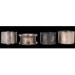 Four Victorian and later silver napkin rings, 107.5 g total