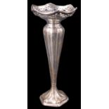 A George V Art Nouveau influenced silver vase, having a pierced everted rim and reeded tapering