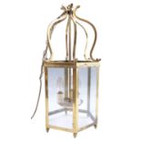 A late 20th Century brass hanging lantern, of hexagonal section, 54.5 cm excluding chain