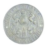 A vintage Milner's Patent safe manufacturer's brass plate, 17.5 cm diameter