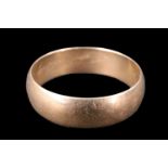 A 9 ct gold wedding band, of D section, London, 3.67 g, size U, 6 mm wide