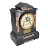 A late Victorian black slate and breche marble mantle clock, having a two train Ansonia movement, an