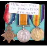 A 1914 Star with British War and Victory Medals to 1376 L Cpl / Sjt H Hill, 1st Manchester Regiment