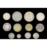 A group of pre - 1920 silver GB coins, including a 1887 half crown, a 1907 florin, etc, together