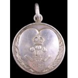 A 1912 10th Royal Hussars Rawalpindi Football Tournament white metal prize fob medallion to a