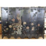 A six panel black lacquer room screen decorated front and verso with magnolia, birds, lilies,
