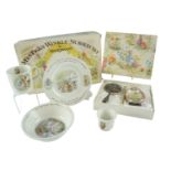 A Wedgwood Mrs Tiggy-Winkle nursery set together with a brush and comb set