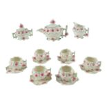 A Victorian ceramic toy / doll's teaset, moulded and polychrome decoration, teacups 5.5 x 4.5 cm