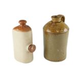 An early 20th Century stoneware flagon bearing impressed lettering 'J & J Graham, Wholesale Grocers,