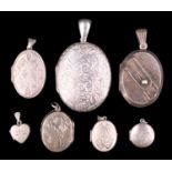 Seven vintage and later white metal lockets, 47.91 g gross, largest 6 x 3.5 cm including bail