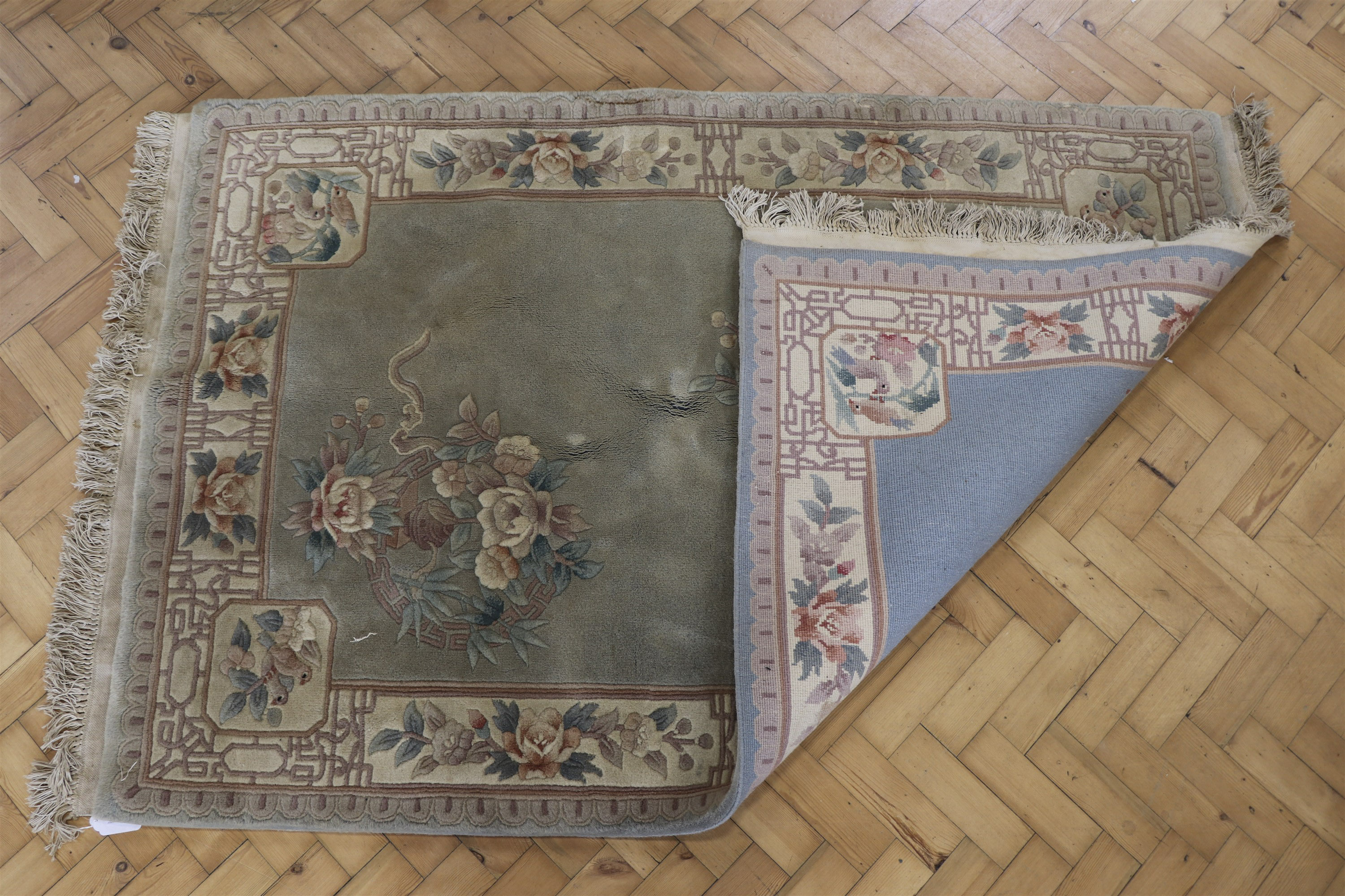 A Chinese wool-pile rug, 200 x 123 cm - Image 2 of 2
