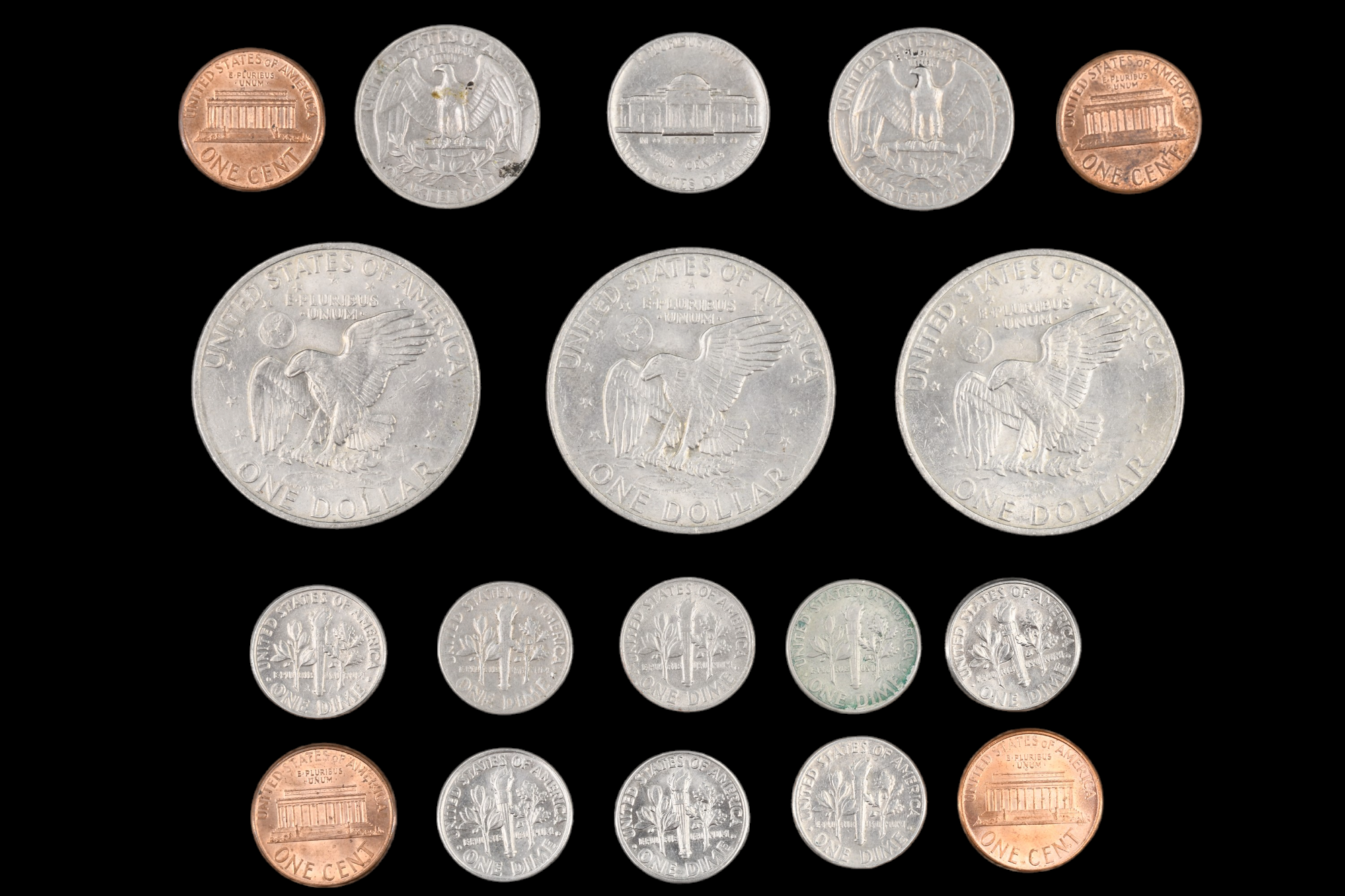 A group of US coins, including three "Eisenhower Dollars", etc