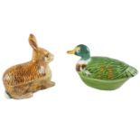Two 1950s French faience pâté tureens by Michel Caugant, respectively in the form of a duck and a