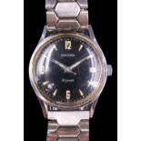 A cased 1960s Sekonda stainless steel wristwatch, having a crown-wound 18 jewel movement, black