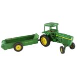 An ETRL Company John Deere tractor and trailer, 19 cm tall