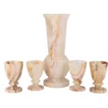 A late 20th Century alabaster vase together with four egg cups