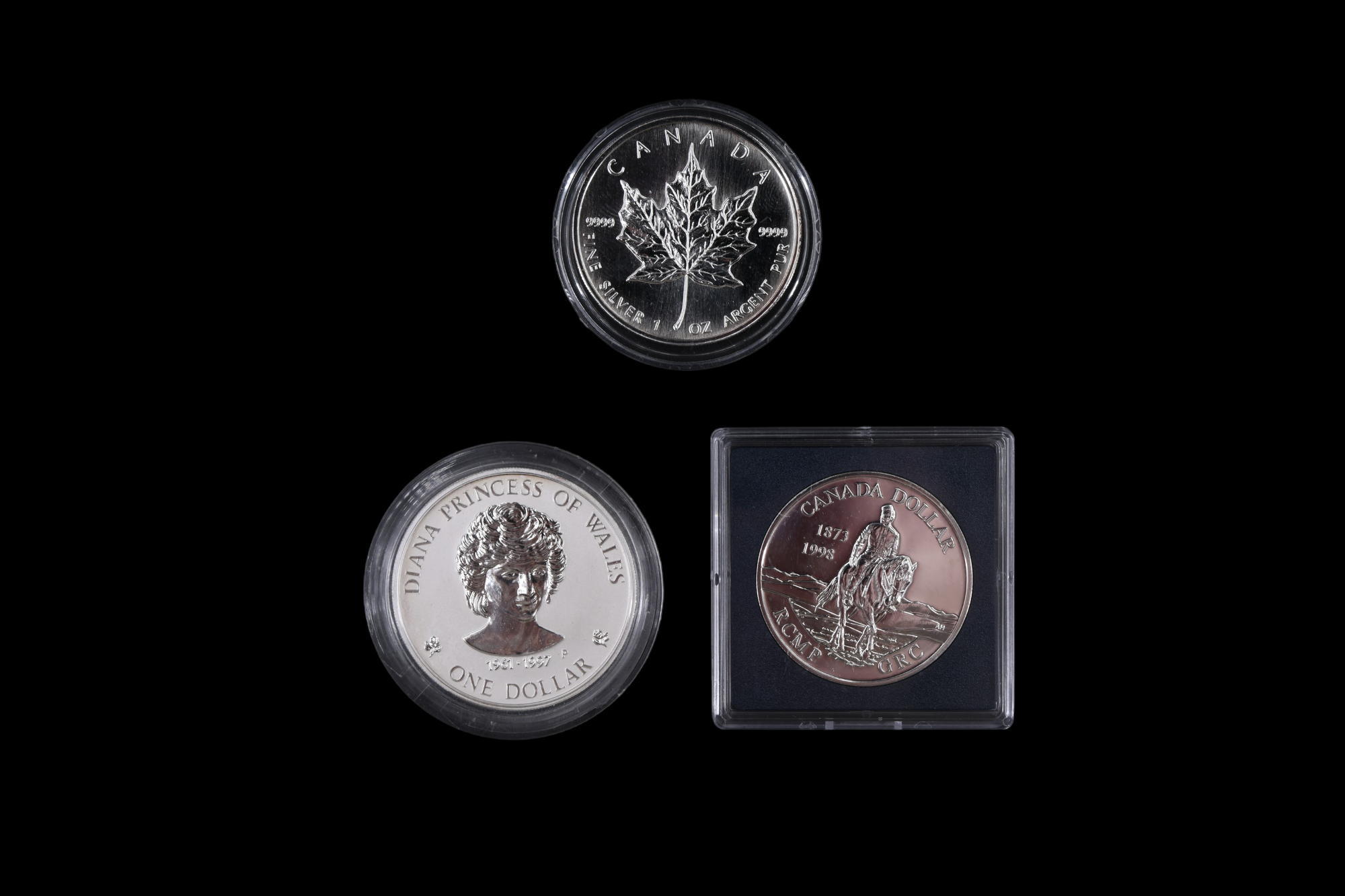 Three silver coins, comprising a 1998 Canada Maple Leaf five dollars, a Canada 1998 dollar, and a - Image 4 of 4